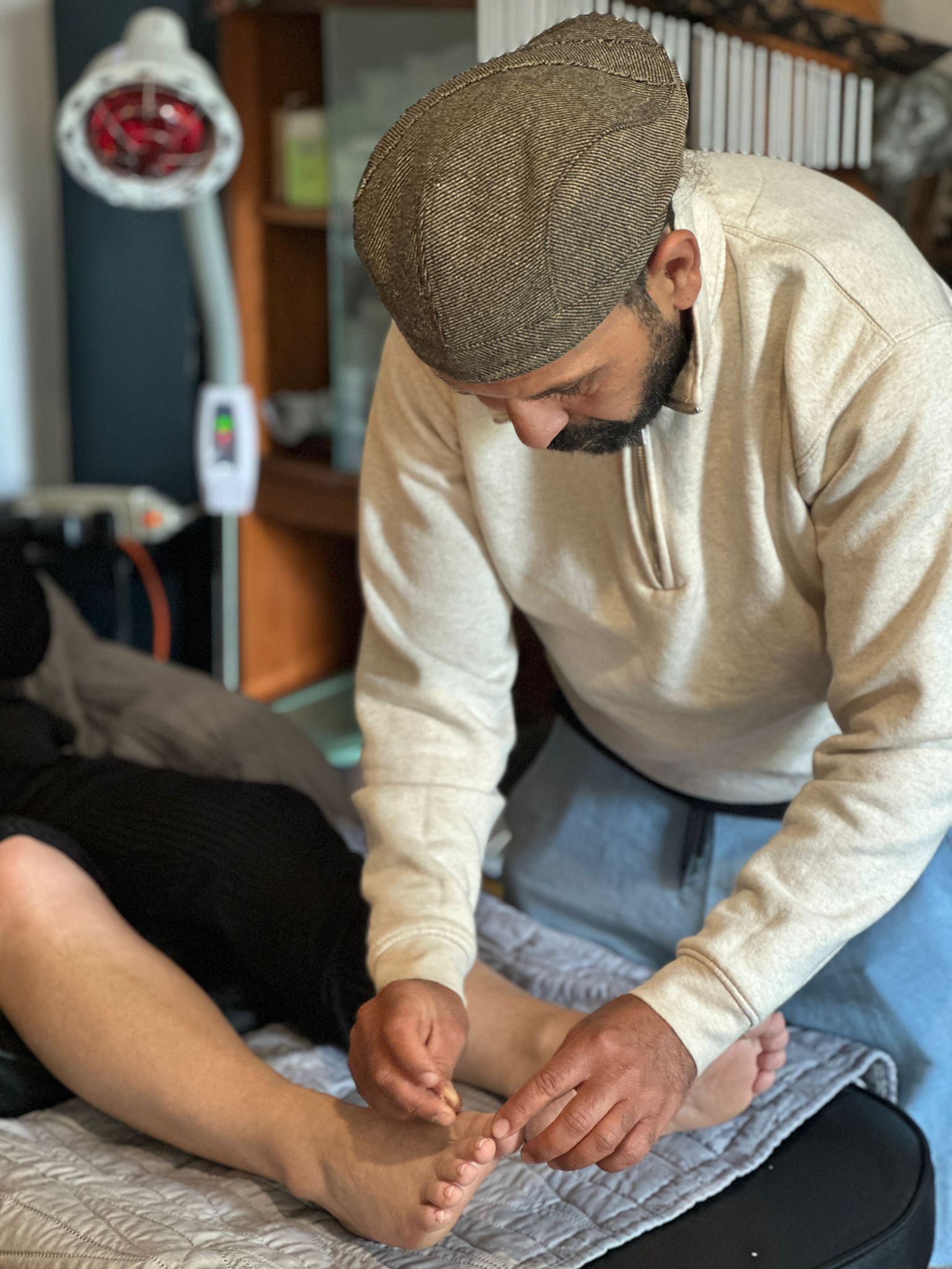 Samir delivering an acupuncture treatment at Healing Hand in Eastbourne